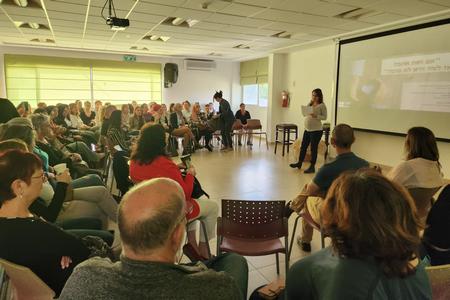 קהל בכנס של המרכז למניעת אלימות במשפחה